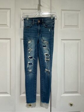 🤎 American Eagle Hi-Rise Jegging Blue Raw Hem Distressed Denim Jeans - 00 Short